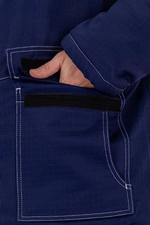 Костюм мужской МЕГАСТАТОЙЛ зимний от нефтепродуктов, кратковременного воздействия пламени, статического электричества, темно-синий/серый/оранж Кос 700