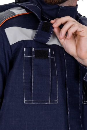 Костюм мужской МЕГАСТАТОЙЛ  для защиты от нефтепродуктов, кратковременного воздействия пламени, статического электричества, цвет темно-синий Кос 415